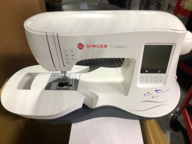 Photo 3 of ****HAS ERRORS AFTER TURNING ON**** 
SINGER | Legacy SE300 Embroidery Machine with 200 Built-In Embroideries, LCD Touch Screen, & 250 Built-In Stitches - Sewing Made Easy