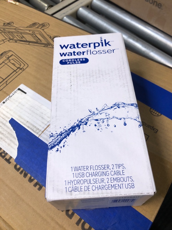 Photo 1 of Waterpik Cordless Pulse Rechargeable Portable Water Flosser for Teeth, Gums, Braces Care and Travel with 2 Flossing Tips, Waterproof, ADA Accepted, WF-20 Blue