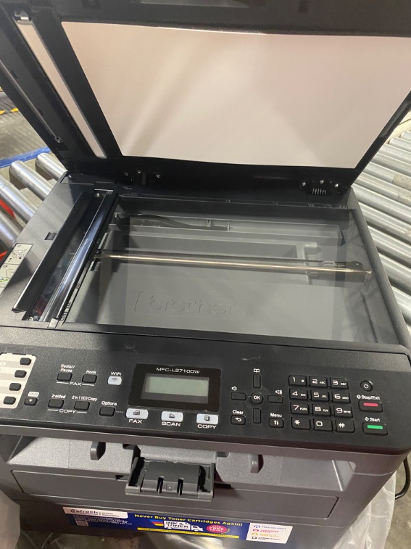 Photo 1 of Brother Monochrome Laser Printer, Compact All-In One Printer, Multifunction Printer, MFCL2710DW, Wireless Networking and Duplex Printing, Amazon Dash Replenishment Ready New Model: MFCL2710DW