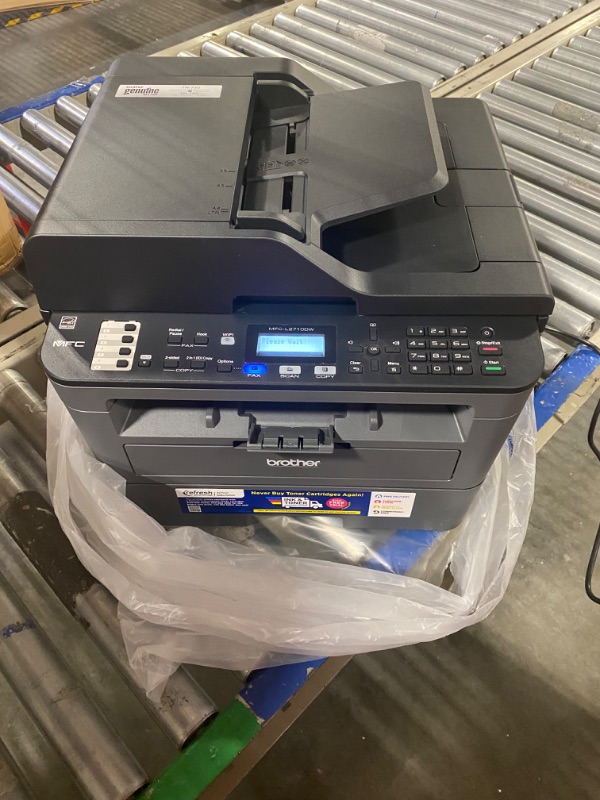Photo 1 of Brother Monochrome Laser Printer, Compact All-In One Printer, Multifunction Printer, MFCL2710DW, Wireless Networking and Duplex Printing, Amazon Dash Replenishment Ready New Model: MFCL2710DW