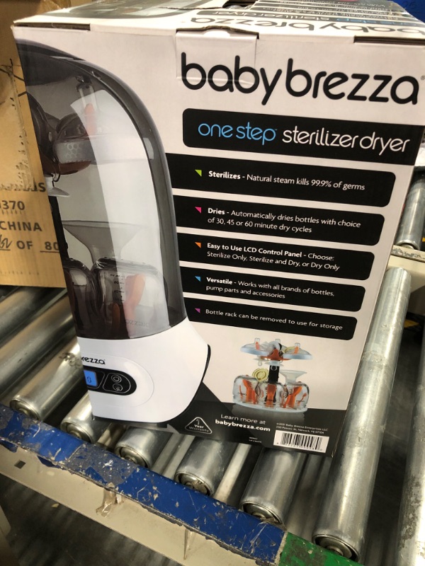 Photo 2 of "new" Baby Brezza Baby Bottle Sterilizer and Dryer Machine – Electric Steam Sterilization - Universal Fit - Pacifiers, Glass, Plastic, and Newborn Feeding Bottles