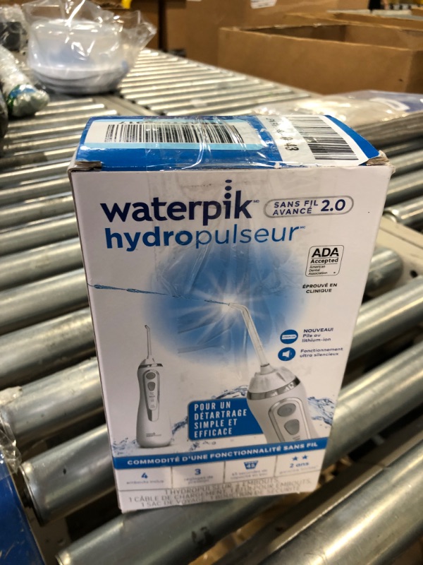 Photo 2 of ****NON FUNCTIONAL//SOLD AS PARTS**** 
Waterpik Cordless Advanced Water Flosser For Teeth, Gums, Braces, Dental Care With Travel Bag and 4 Tips, ADA Accepted, Rechargeable, Portable, and Waterproof, White WP-580 White Water Flosser