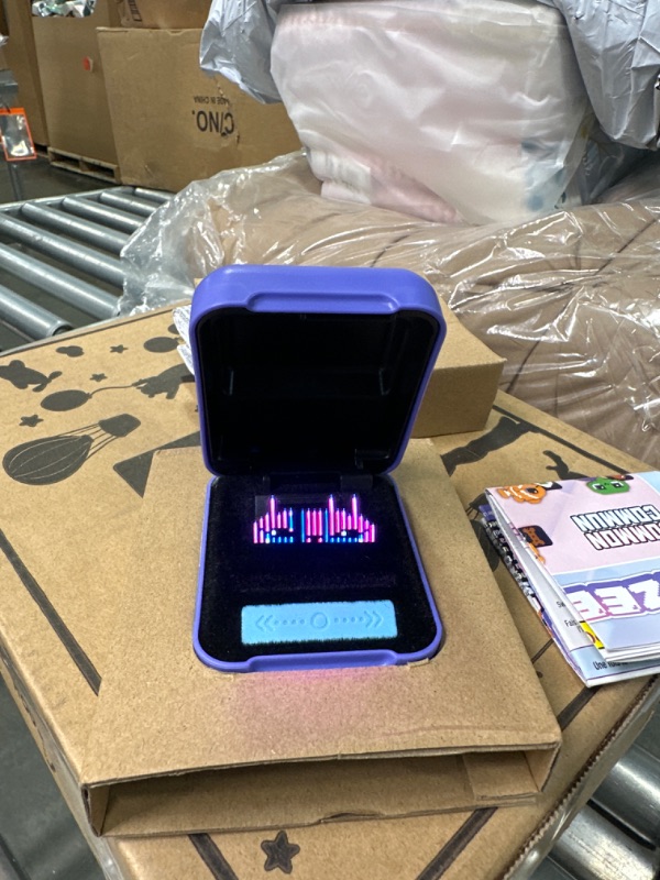 Photo 1 of Bitzee, Interactive Toy Digital Pet and Case with 15 Animals Inside, Virtual Electronic Pets React to Touch, Kids Toys for Girls and Boys
