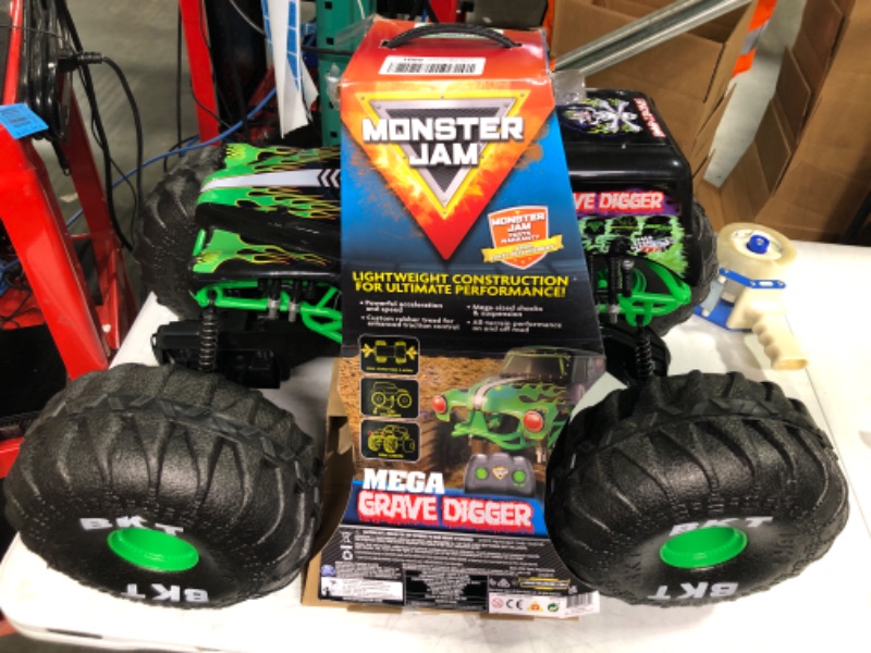 Photo 1 of Monster Jam Official Mega Grave Digger All-Terrain Remote Control Monster Truck with Lights - 1:6 Scale