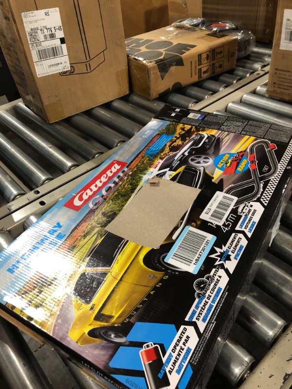 Photo 1 of Carrera GO!!! Battery Operated 1:43 Scale Slot Car Racing Toy Track Set with Jump Ramp for Kids Ages 5 Years and Up, Highway Chase