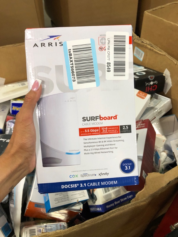 Photo 2 of ARRIS Surfboard S33 DOCSIS 3.1 Multi-Gigabit Cable Modem | Approved for Comcast Xfinity, Cox, Spectrum & More | 1 & 2.5 Gbps Ports | 2.5 Gbps Max Internet Speeds | 4 OFDM Channels | 2 Year Warranty DOCSIS 3.1 Modem Only Router System