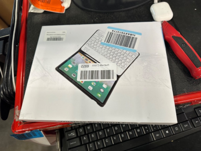 Photo 1 of aoub Case for iPad 9th/8th/7th Generation 10.2 inch, Stand Folio Detachable Wireless Bluetooth Keyboard Cover Soft TPU Back Case with Pencil Holder for iPad 10.2 2021/2020/2019, Orange