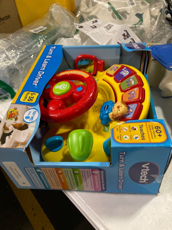 Photo 2 of **NON FUNCTIONAL SOUND** 
VTech Turn and Learn Driver, Yellow Yellow Standard Packaging