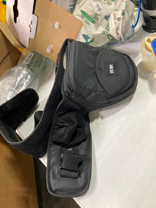 Photo 1 of HKAI Baby Carrier Hip Seat, Advanced Large Capacity Pocket with Adjustable Waistband, Shock Absorption Hip Seat Surface for Newborns & Toddlers, (Black)