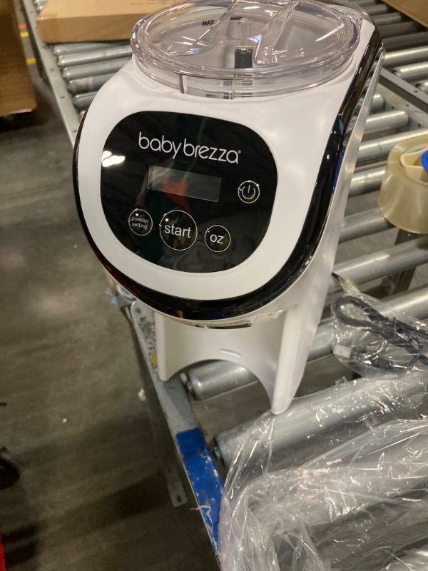 Photo 3 of Baby Brezza Formula Pro Mini Baby Formula Maker – Small Baby Formula Mixer Machine Fits Small Spaces and is Portable for Travel– Bottle Makers Makes The Perfect Bottle for Your Infant On The Go Formula Pro Mini Dispenser Machine