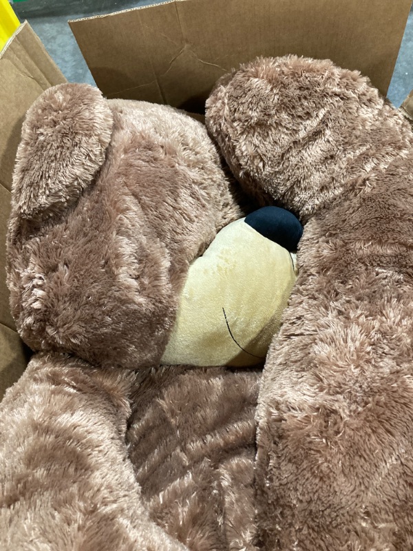 Photo 1 of (MINOR TEAR ON ARMS ) Giant Teddy Bear Stuffed Animal 51in, Big Teddy Bear Stuffed Bears, Calming Large Teddy Bear Plush for Kids, Girlfriend, Baby Shower, Brown
