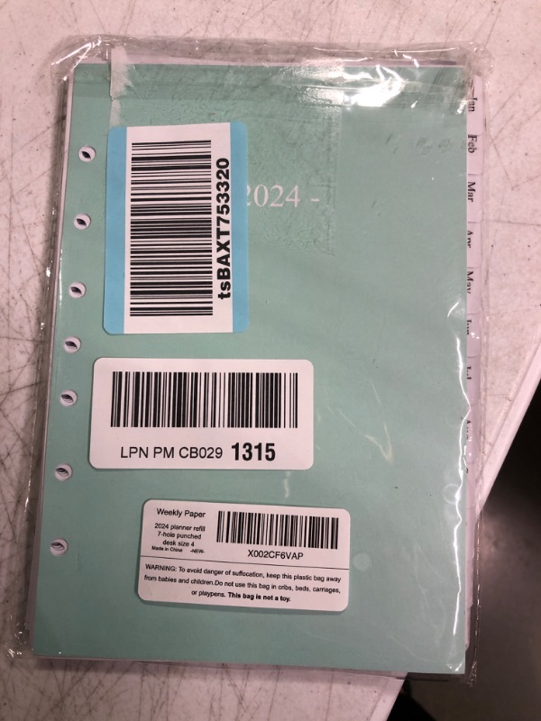 Photo 2 of 2023 Weekly & Monthly Planner Refill, 5-1/2" x 8-1/4", Runs from January 2023 to December 2023, Ruled Daily Boxes, Desk Size 4, 7-Hole Punched Classic (Size 4) 2023