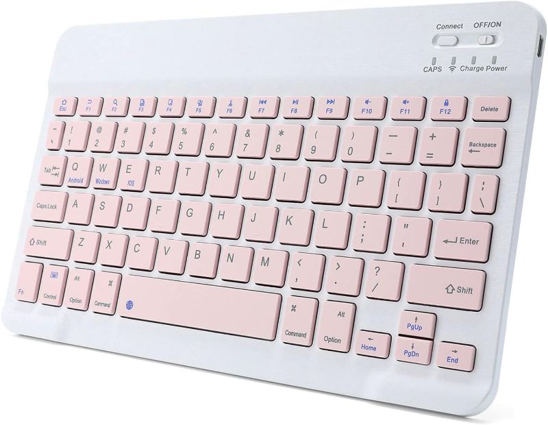 Photo 1 of **Has a cut on top of keyboard, left side**
Ultra-Slim Rechargeable Bluetooth Keyboard Portable Compact Wireless Keyboard for Android Windows Samsung Galaxy Tab Tablet Smartphone Cell Phone iOS iPhone iPad, iPad Pro, iPad Air, iPad Mini (Pink