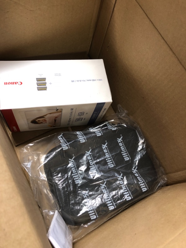 Photo 1 of Canon SELPHY CP1300 Wireless Compact Photo Printer with AirPrint and Mopria Device Printing, with Canon KP108 Paper and Black Hard case to fit All Together (White)