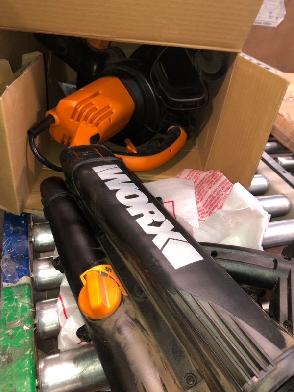 Photo 3 of ***VERY USED** Worx WG509 12 Amp TRIVAC 3-in-1 Electric Leaf Blower with All Metal Mulching System