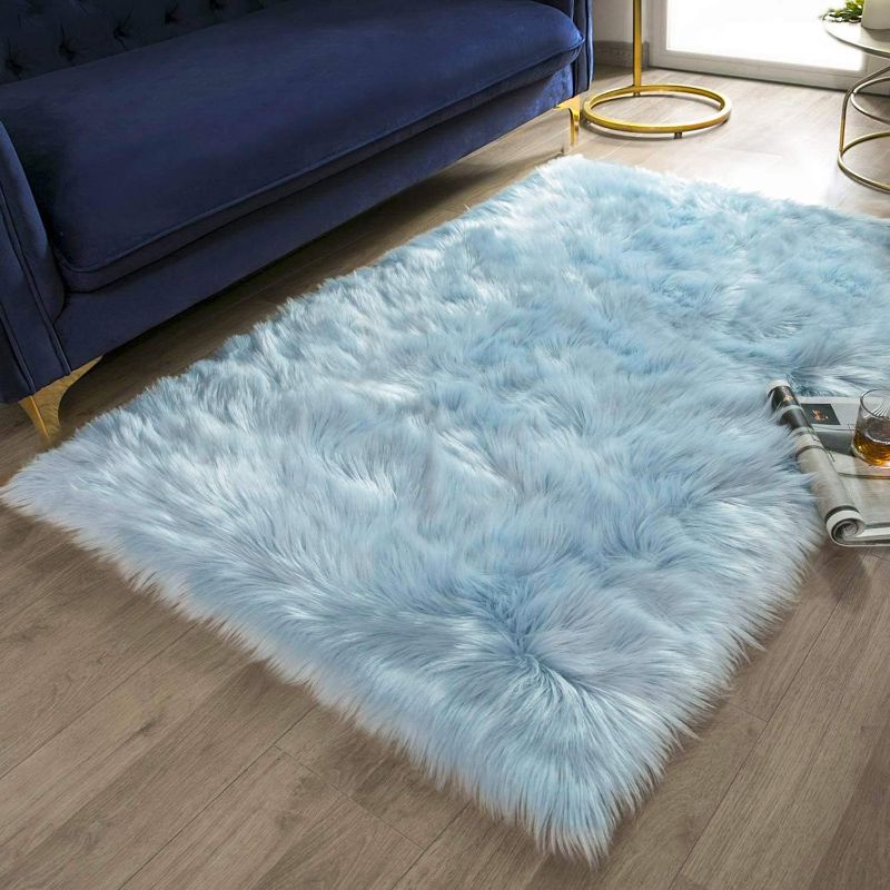 Photo 1 of Ashler faux fur rug, Fluffy Shaggy Area Rug Ultra Soft 3 x 5 Feet Rectangle Fur Rug Light Blue Fuzzy Rug Machine Washable Shag Rug, Nursery Decor Throw Rugs for Bedroom, kids room, Living Room