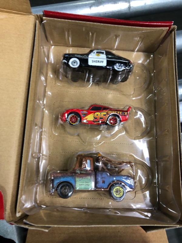 Photo 1 of Disney Car Toys Toys, Radiator Springs 3-Pack of Die-Cast Toy Cars & Trucks with Lightning McQueen, Mater & Sheriff Gift Set 3-Pack Cars