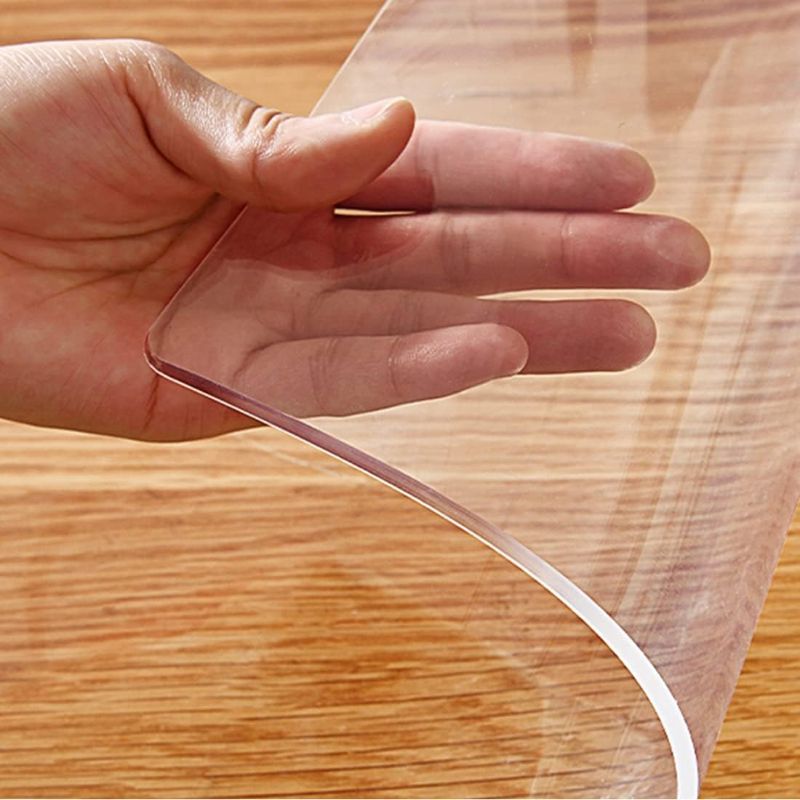 Photo 1 of Rectangular Clear PVC Plastic Table Cloth 16x30 inch Clear PVC Vinyl Desk Pad Mat Wood Furniture Screen Protector Non-Slip Desk Top Mat for Computer Desk Coffee Table Dresser Sofa Table Dinner Table
