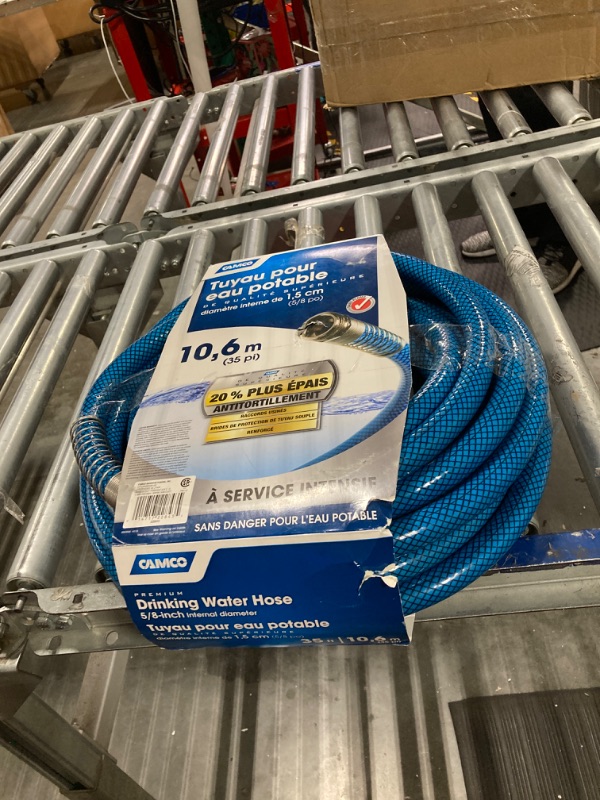 Photo 2 of Camco TastePURE 35-Ft Premium Water Hose - RV Drinking Water Hose Contains No Lead, No BPA & No Phthalate - Reinforced PVC Design w/Strain Relief Ends - 5/8” Inside Diameter, Made in the USA (22843) 35-Foot