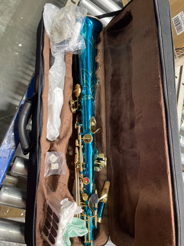 Photo 2 of ******Not curved look at stock picture*****
EASTROCK Soprano Saxophone straight Bb Flat blue Sax Instruments for Beginners Students Intermediate Players with Carrying Case,Mouthpiece,Pads,Reed,Cleaning kit,neck Strap,White Gloves Straight-Blue