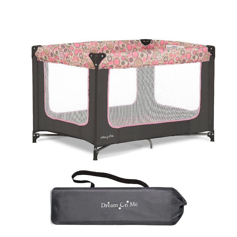 Photo 1 of Dream On Me Zodiak Portable Playard in Grey and Pink, Lightweight, Packable and Easy Setup Baby Playard, Breathable Mesh Sides and Soft Fabric - Comes with a Removable Padded Mat