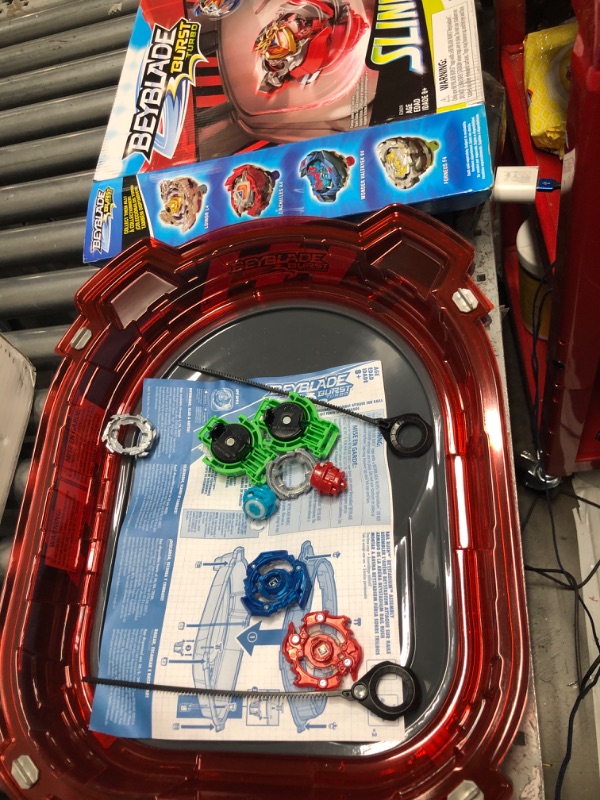 Photo 2 of BEYBLADE Burst Turbo Slingshock Rail Rush Battle Set -- Complete Set Burst Beystadium, Battling Tops, and Launchers (Amazon Exclusive)