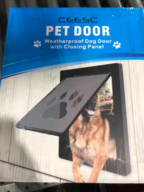 Photo 1 of 16x14" Pet door with weatherproof panels
WHITE