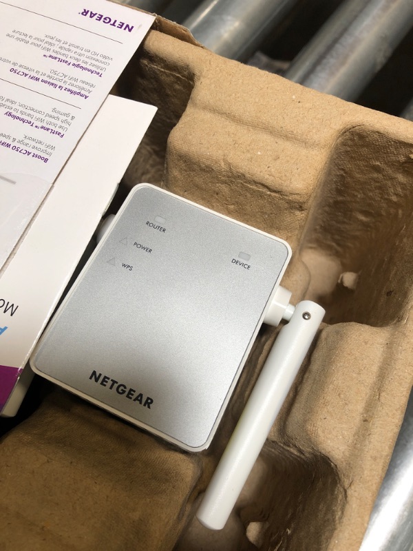 Photo 1 of NETGEAR Wi-Fi Range Extender EX3700 - Coverage Up to 1000 Sq Ft and 15 Devices with AC750 Dual Band Wireless Signal Booster & Repeater (Up to 750Mbps Speed), and Compact Wall Plug Design WiFi Extender AC750