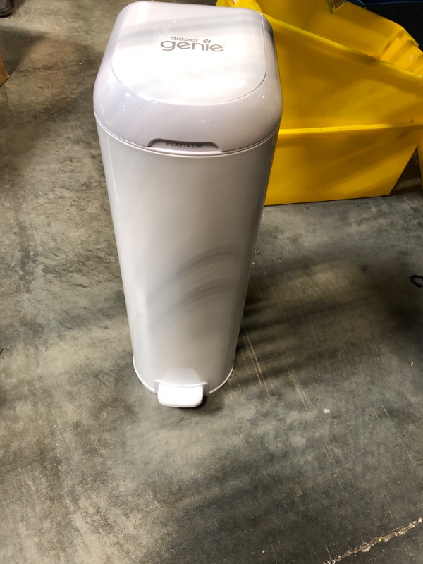 Photo 1 of Diaper Genie Platinum Pail (Lilly White) is Made of Durable Stainless Steel and Includes 1 Easy Roll Refill with 18 Bags That can Last up to 5 Months.