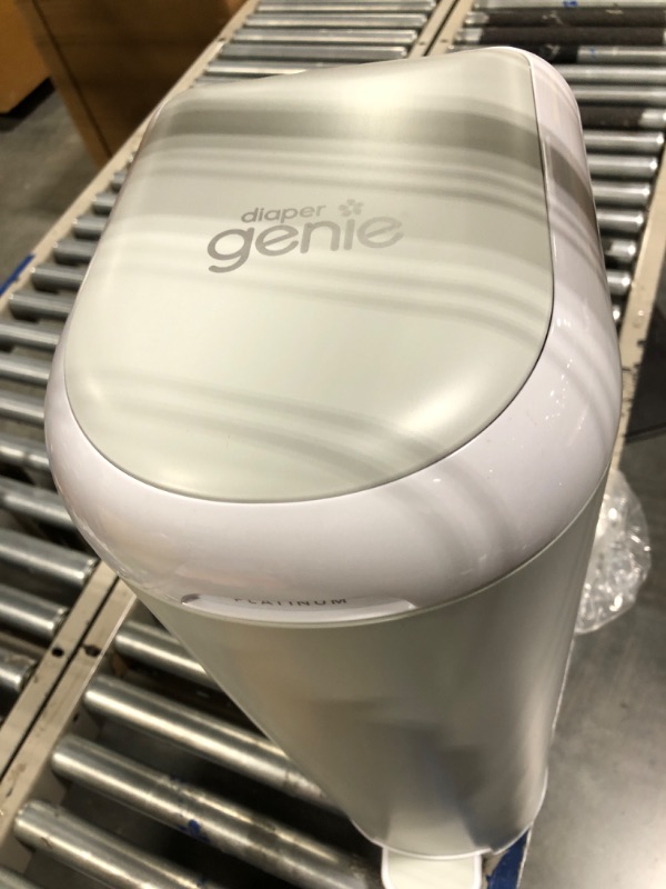 Photo 4 of Diaper Genie Platinum Pail (Stone Grey) is Made in Durable Stainless Steel and Includes 1 Easy Roll Refill with 18 Bags That can Last up to 5 Months.