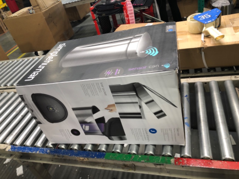 Photo 1 of simplehuman 45 Liter / 12 Gallon Semi-Round Automatic Sensor Trash Can, Brushed Stainless Steel