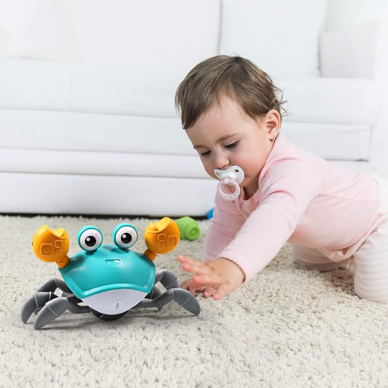 Photo 1 of Aprilwolf Escape Crawling Baby Crab Toy, Tummy Time Baby Toys, Sensing Interactive Walking Dancing with Music Sounds & Lights, Infant Fun Birthday Toddler Boy Girl Pet Dog?Rechargable