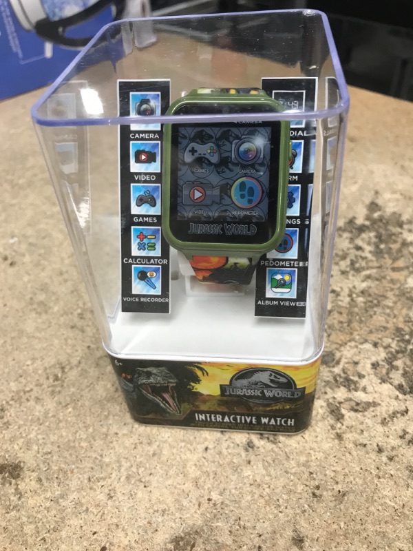 Photo 2 of Accutime Jurassic Park Smartwatch for Kids: Educational Touchscreen Game Watch with Camera, Games, Alarm, Calculator - Durable, Fun Learning Wearable for Boys & Girls (Model: JRW4062AZ)