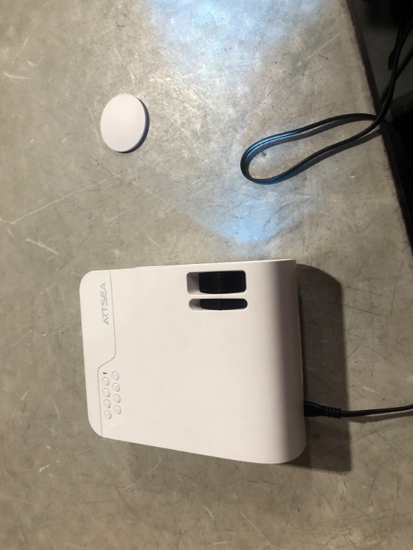 Photo 2 of **UNKNOWN IF FUNCTIONAL, UNTESTED, NO POWER CORD**
Projector, ARTSEA Native 1080P 5G WiFi HD Projector for iPhone,