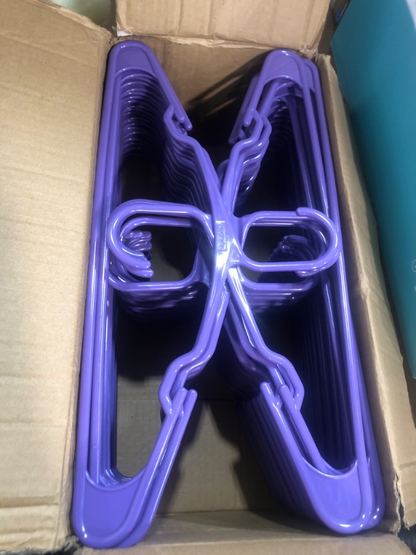 Photo 1 of 50 pack plastic hangers