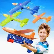 Photo 1 of 3 Pack LED Light Airplane Launcher Toys,Catapult Foam Glider Planes Toys with 3 DIY Stickers + 2 Flight Modes,Outdoor Sport Flying Toys for Kids Gifts for 4 5 6 7 8 9 10 12 Year Olds