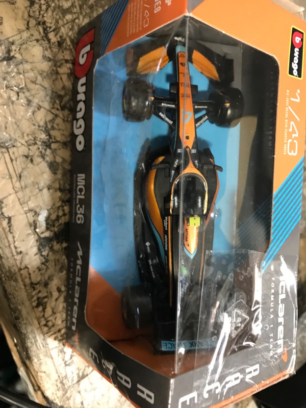 Photo 2 of Bburago 1:43 Race McLaren Racing MCL36 (2022) w/ #4 Norris Driver