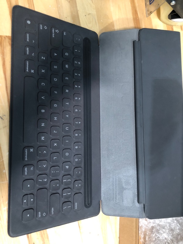 Photo 2 of Wireless Smart Keyboard for Ipad pro, 12.9in Portable Tablet Intelligent Carrying Foldable Ultra-Slim Keyboard with 64 Keys for Ipad Pro 2nd Generation & 1st Generation