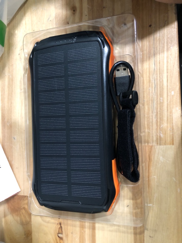 Photo 2 of PD 18W QC 3.0 Solar Power Bank, 16000mAh Qi Portable Solar Charger, Fast Charging External Battery Compatible with iPhone, iPad, GPS, etc. IP65 Flashlight for Outdoor Camping (16000mAh)