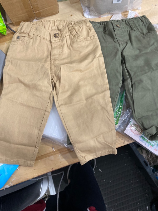 Photo 1 of 2  PAIR OF 12M boy pants, Green and kaki 