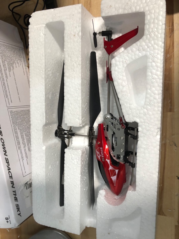 Photo 1 of *ONLY GOES UP AND DOWN DOES NOT GO FORWARD OR BACKWARDS*
Remote Control Helicopter, S107H-E Aircraft with Altitude Hold