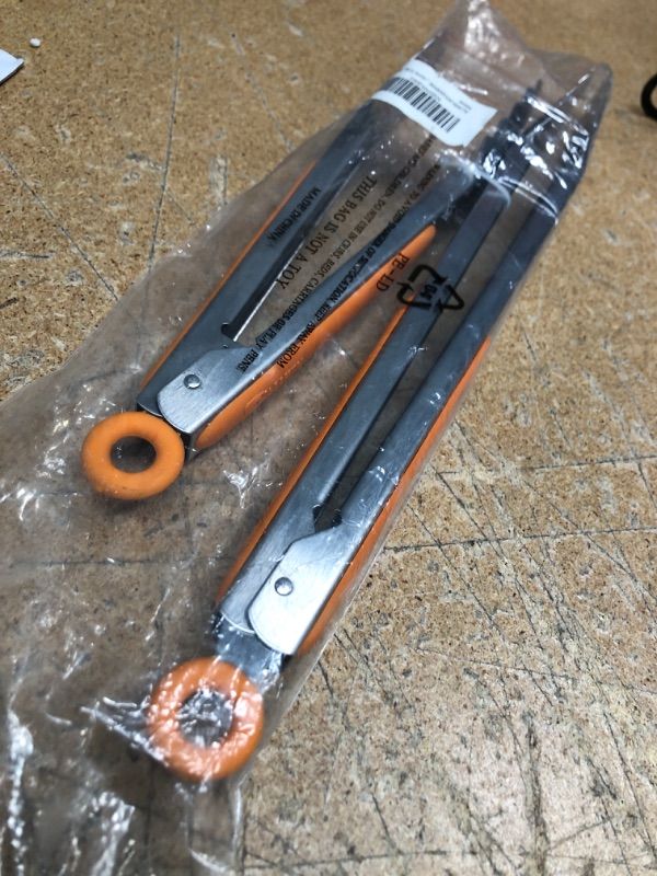 Photo 1 of 2 piece stainless steel ergonomic grip-orange tongs