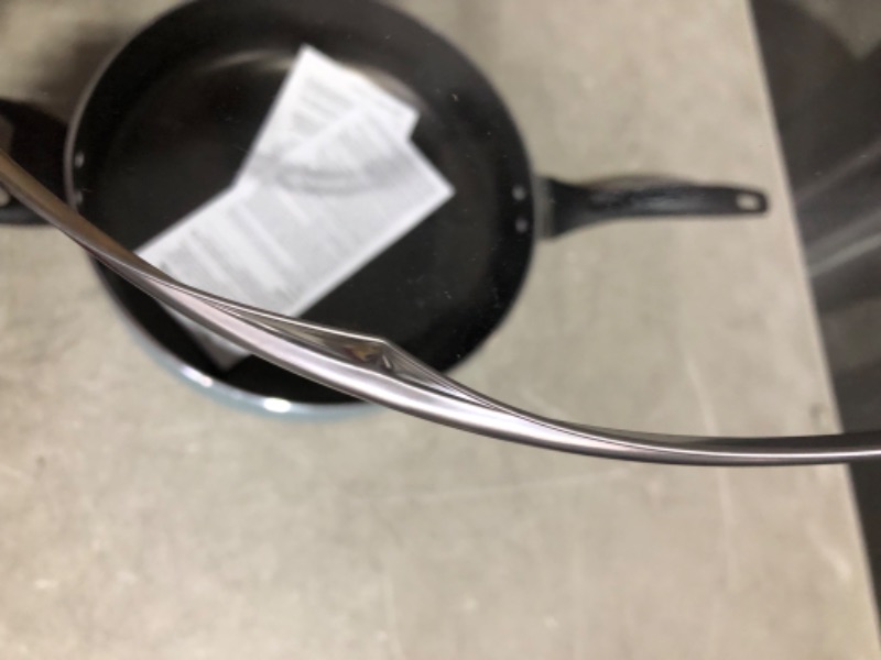 Photo 4 of ***DAMAGED - LID BENT - SEE PICTURES***
Farberware Dishwasher Safe Nonstick Jumbo Cooker/Saute Pan with Helper Handle - 6 Quart, Blue Aqua Cooker - 13 Inch Diameter