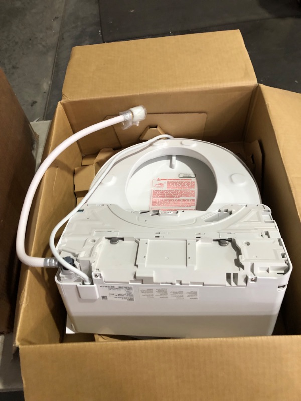 Photo 7 of ***USED - LIKELY MISSING PARTS - UNABLE TO VERIFY FUNCTIONALITY***
TOTO SW2043R#01 C200 Electronic Bidet Toilet Cleansing Water, Heated Seat, Deodorizer, Warm Air Dryer, and PREMIST, Round, Cotton White Cotton White Round Cleansing Water