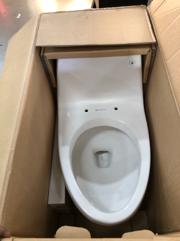 Photo 2 of 1-piece 1.1 GPF/1.6 GPF High Efficiency Dual Flush Elongated Toilet in White Slow-Close, Seat Included