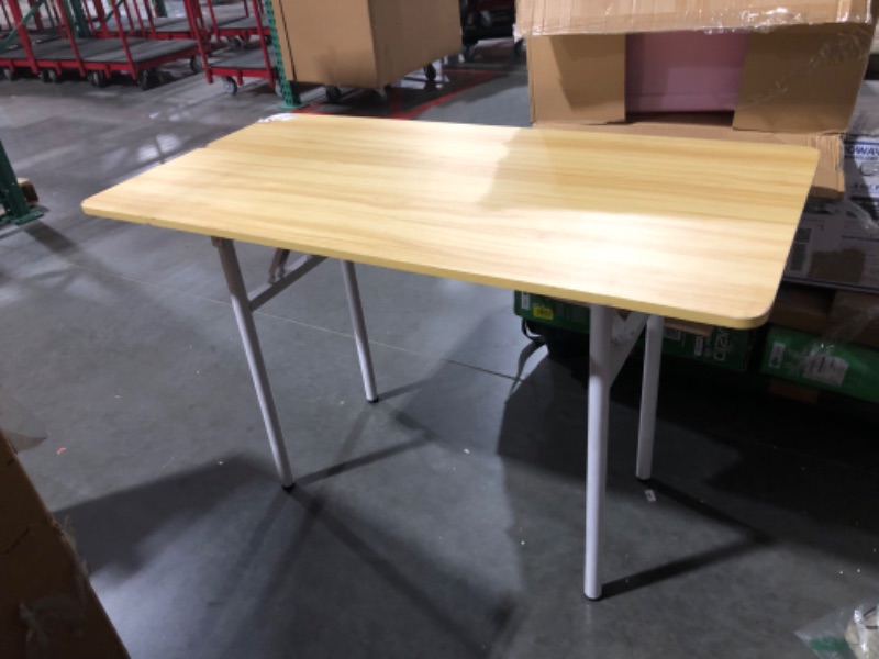 Photo 1 of ***USED - NO PACKAGING - DAMAGE - WOOD GOUGED AND SCRATCHED - SEE PICTURES***
Folding Table, White Legs/Beige Top, 48" L x 24" W x 30" H