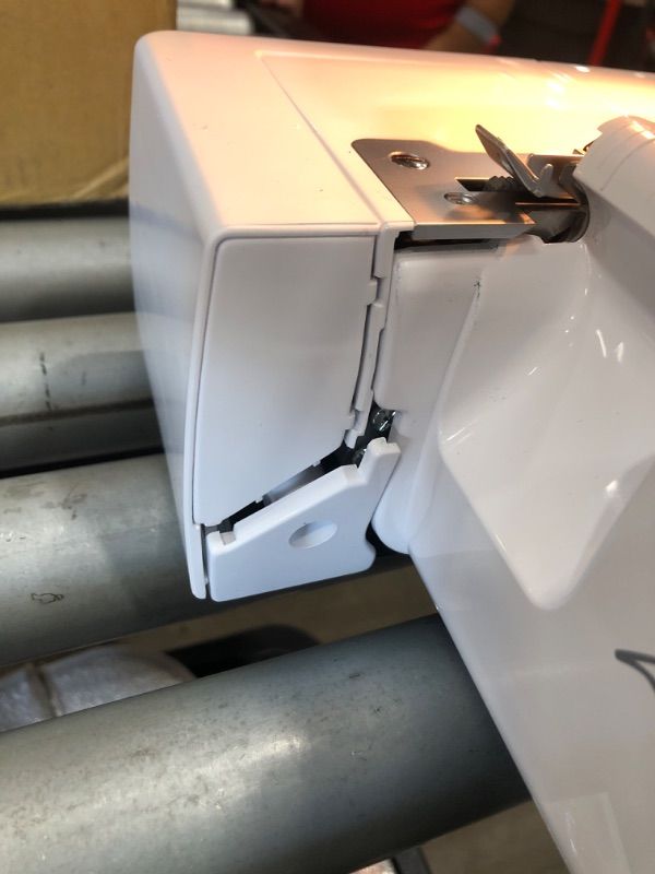 Photo 6 of *PARTS ONLY* BROTHER SERGER, 1034D, HEAVY-DUTY METAL FRAME OVERLOCK MACHINE, 1,300 STITCHES PER MINUTE, REMOVEABLE TRIM TRAP, 3 INCLUDED ACCESSORY FEET,WHITE
