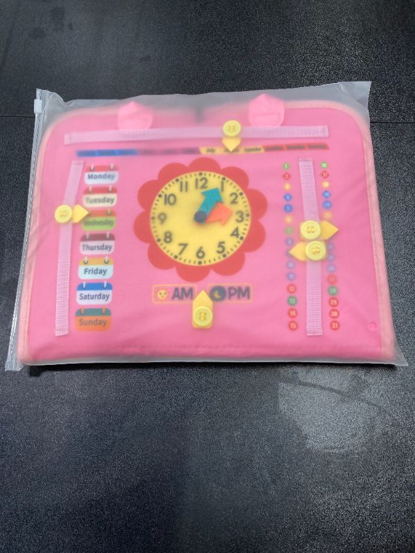 Photo 1 of Kids Busy Board for Toddler-Educational Toy for Fine Motor Skills and Problem-Solving -Toddler Airplane Travel Essentials with Buckles, Zippers, and More -Perfect for Toddlers and Preschoolers (Pink)