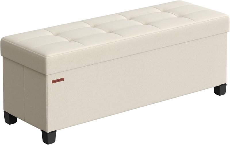 Photo 1 of SONGMICS Storage Ottoman Bench, Foldable Foot Rest with Legs, 15 x 43 x 15.7 Inches, End of Bed Bench, Storage Chest, Load up to 660 lb, for Living Room, Bedroom, Entryway, Cream White ULSF018W01
