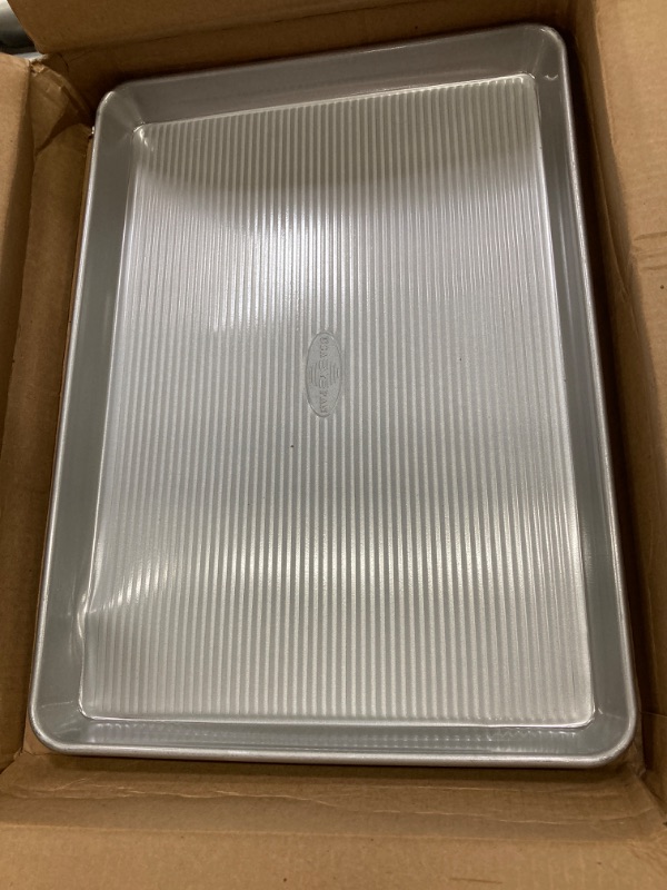 Photo 2 of ***DENTED*** USA Pan Bakeware Half Sheet Pan, Warp Resistant Nonstick Baking Pan, Made in the USA from Aluminized Steel 